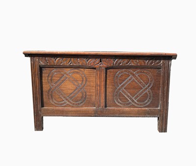 Lot 220 - An oak coffer, early 18th century, with a...