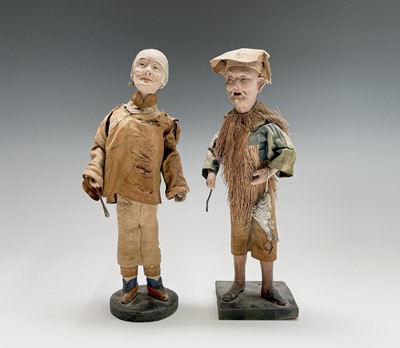 Lot 218 - Two Japanese bisque porcelain figures of...