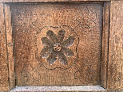 Lot 21 - A carved oak coffer, 17th century, with a...