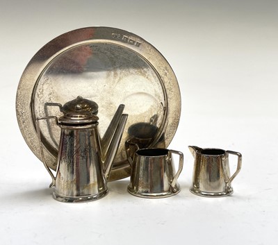 Lot 459 - A three-piece miniature silver coffee service...