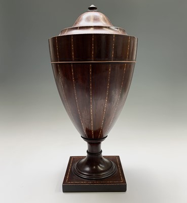 Lot 12 - A George III mahogany cutlery urn, with...