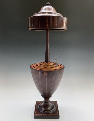 Lot 12 - A George III mahogany cutlery urn, with...