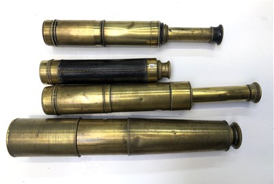 Lot 530 - Four brass telescopes.