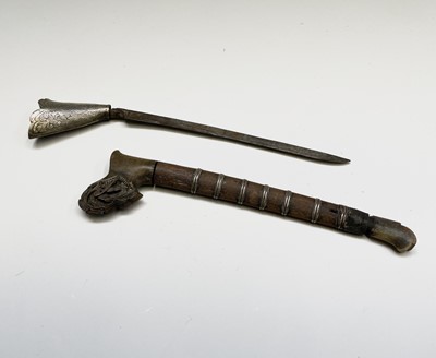 Lot 27 - A small Malaysian kris with white metal grip...