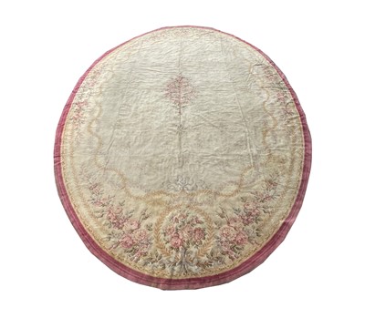 Lot 1247 - A large Donegal oval carpet, late 19th century,...