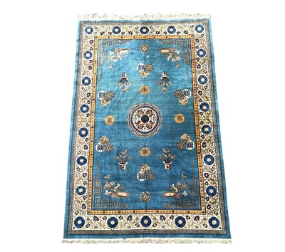 Lot 1230 - A Chinese carpet, circa 1930, the indigo field...