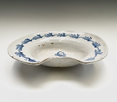 Lot 93 - A tin glazed barber's bowl, 18th century,...