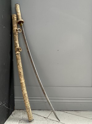 Lot 126 - A Japanese carved ivory Samurai sword, Meiji...