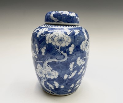 Lot 110 - A Chinese porcelain prunus blossom blue and...