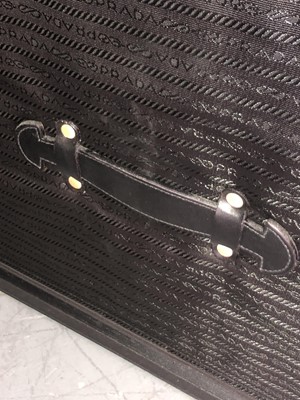 Lot 2815 - A Prada black Vitello leather & nylon wardrobe...