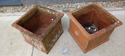 Lot 526 - A pair of square terracotta plant pots with...