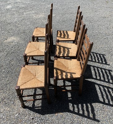 Lot 135 - A set of six ladderback rush seated dining...