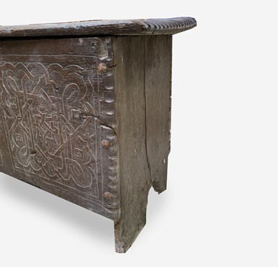 Lot 78 - A carved oak sword chest, 17th century, the...