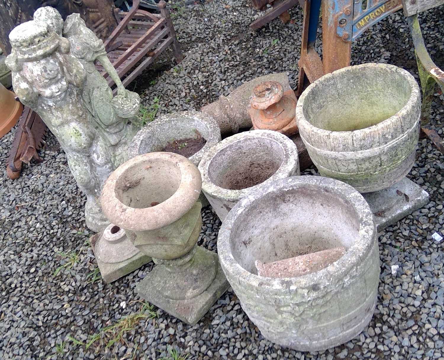 Lot 659 Assorted plant pots and statues.