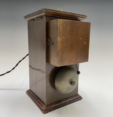 Lot 140 - An electric bell, in mahogany case, a 1940s Vi-...