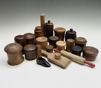 Lot 149 - A collection of treen jars and containers, and...