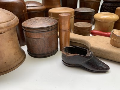 Lot 149 - A collection of treen jars and containers, and...