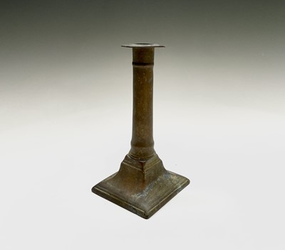 Lot 110 - An 18th century brass candlestick, with...