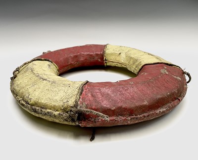 Lot 128 - A vintage cork filled lifebuoy, with painted...