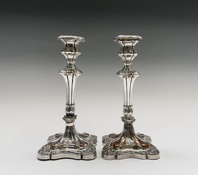 Lot 165 - An Arts and Crafts style silver plated twin...