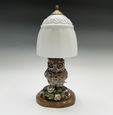 Lot 169 - A late 19th century continental porcelain lamp...