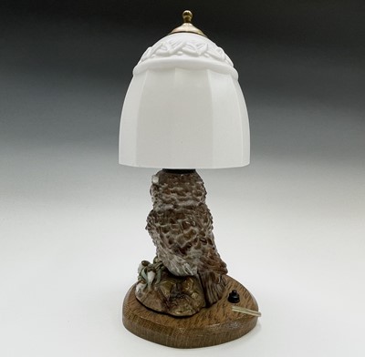 Lot 169 - A late 19th century continental porcelain lamp...