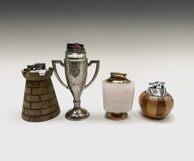 Lot 177 - A large collection of table lighters,...