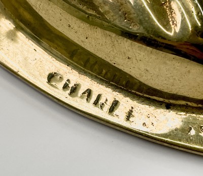 Lot 191 - A 19th century circular brass plaque depicting...