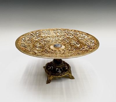 Lot 221 - An ornate gilt metal openwork tazza, raised on...