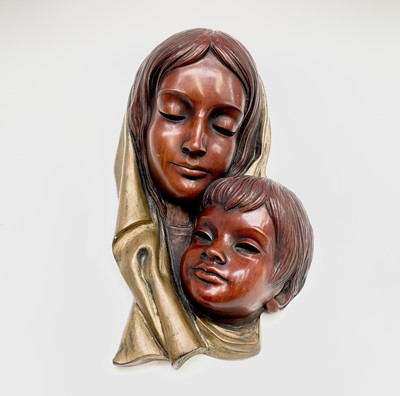Lot 922 - A mid-century earthenware wall mask depicting...