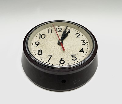 Lot 2905 - A Bakelite cased circular wall clock, the dial...