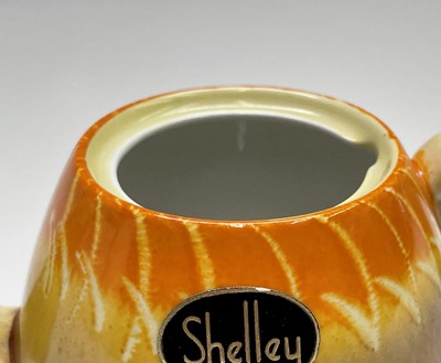 Lot 929 - A 1930s Shelley drip ware teapot, with...