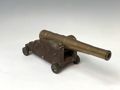 Lot 205 - A brass model of a cannon, late 19th/early...