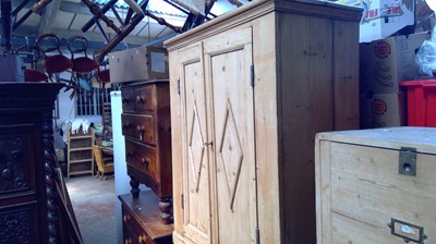 Lot 142 - A Victorian pine cupboard, the pair of...