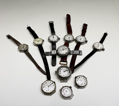 Lot 233 - A collection of eleven trench watches.