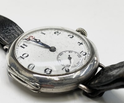 Lot 233 - A collection of eleven trench watches.