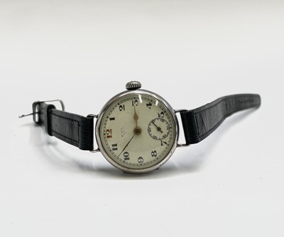 Lot 233 - A collection of eleven trench watches.