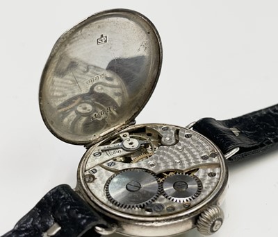 Lot 233 - A collection of eleven trench watches.