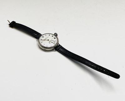 Lot 233 - A collection of eleven trench watches.