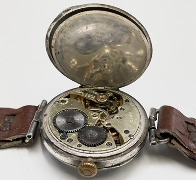 Lot 233 - A collection of eleven trench watches.