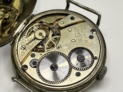 Lot 233 - A collection of eleven trench watches.