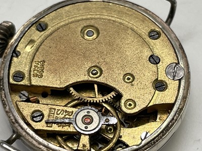 Lot 233 - A collection of eleven trench watches.