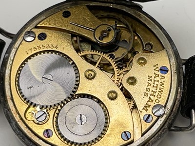Lot 233 - A collection of eleven trench watches.
