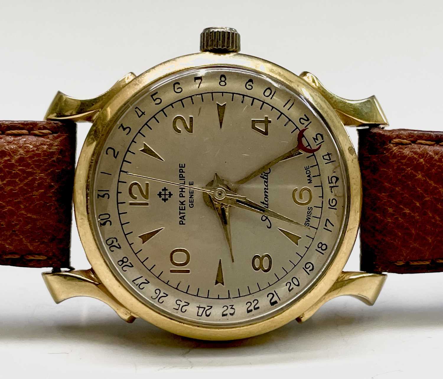 Lot 15 - A gentleman's automatic watch with spurious...