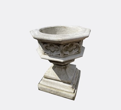 Lot 602 - A reconstituted stone Gothic font style...