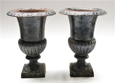 Lot 165 - A pair of black painted cast metal garden urns,...