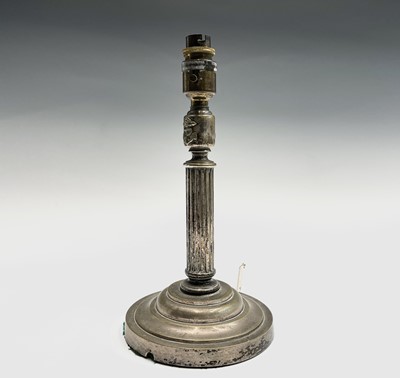 Lot 208 - A silver plated table lamp, on circular base,...