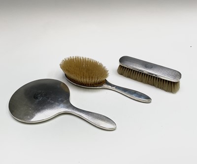 Lot 443 - Two silver-mounted brushes and mirror - each...