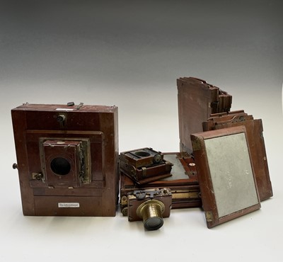 Lot 253 - A late Victorian mahogany and brass plate...