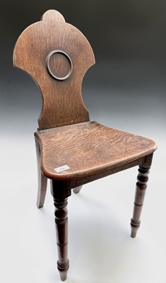 Lot 236 - An early Victorian oak hall chair, height 84cm,...